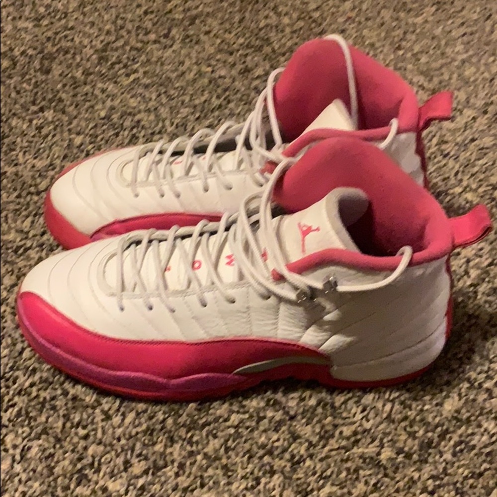 Pink an white Jordan 12s